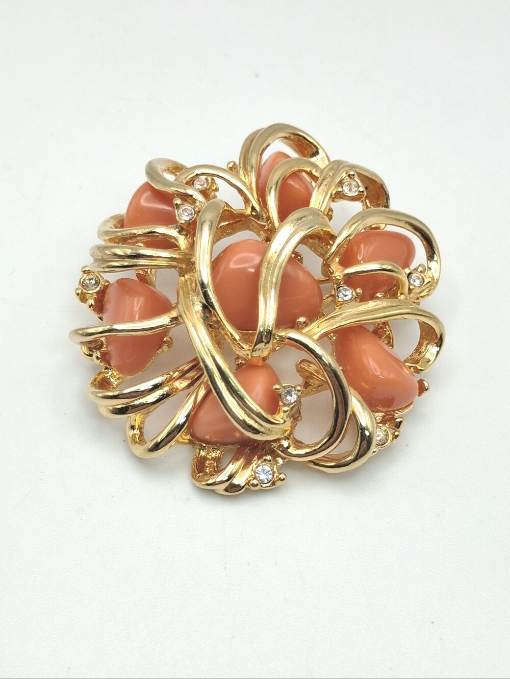 PW7. Joan Rivers Gold Tone Coral LuciteSwirl Brooch with Rhinestones